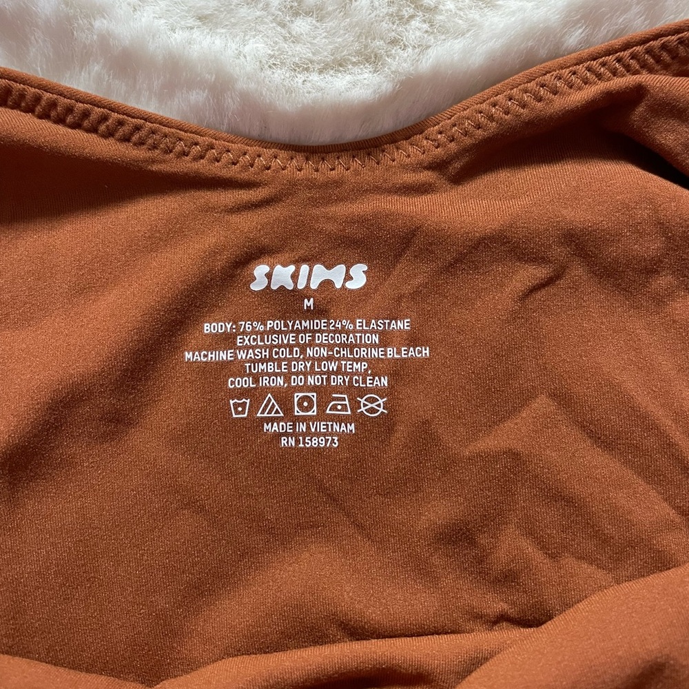 Skims body suit